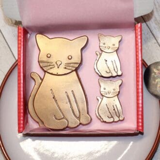 Milk chocolate cat and kittens
