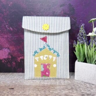 iPad mini case with appliquéd beach hut