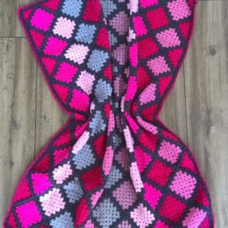 An Exclusive Handcrafted Pink and Grey Baby Blanket