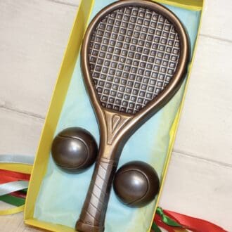 Tennis racket and Tennis balls in dark chocolate accidentally vegan