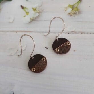 Handmade recycled copper earrings with a textured segment and sterling silver ear wires