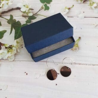 Handmade recycled copper drop earrings with a mesh texture segment and hand formed sterling silver ear wires