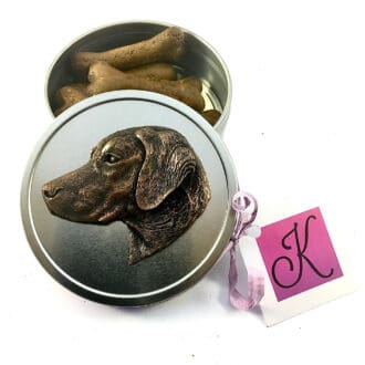 Labrador retriever round pocket treat tin with a sculpted metal dog's head portrait on the lid