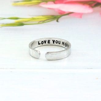 4mm wide aluminium hammered texture ring with hidden message hand-stamped inside