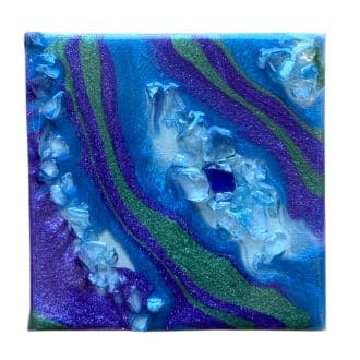 Geode inspired resin artwork.