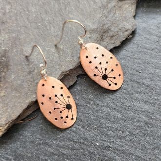copper-oval-earrings-with-pierced-allium-design