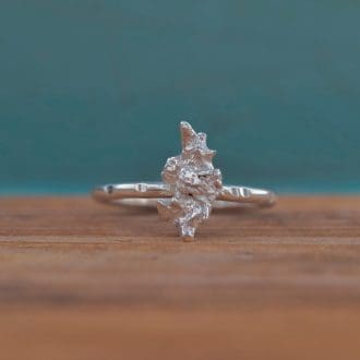 Bespoke hammered recycled silver snowflake ring cast in rock salt and made in Cornwall