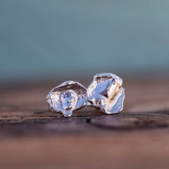 Small bespoke recycled silver water cast stud earrings organically shaped