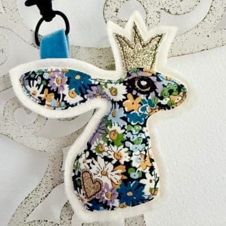 Floral liberty fabric keyring or bag charm, one of a kind practical everyday accessory. Perfect gift for lovers of hares and wildlife.