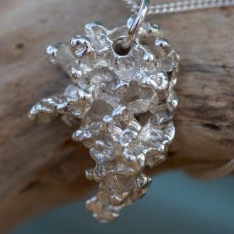 Bespoke recycled silver salt cast pendant necklace organically shaped and made in Cornwall