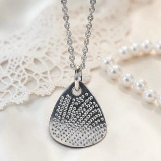 minimal artisan silver pendant